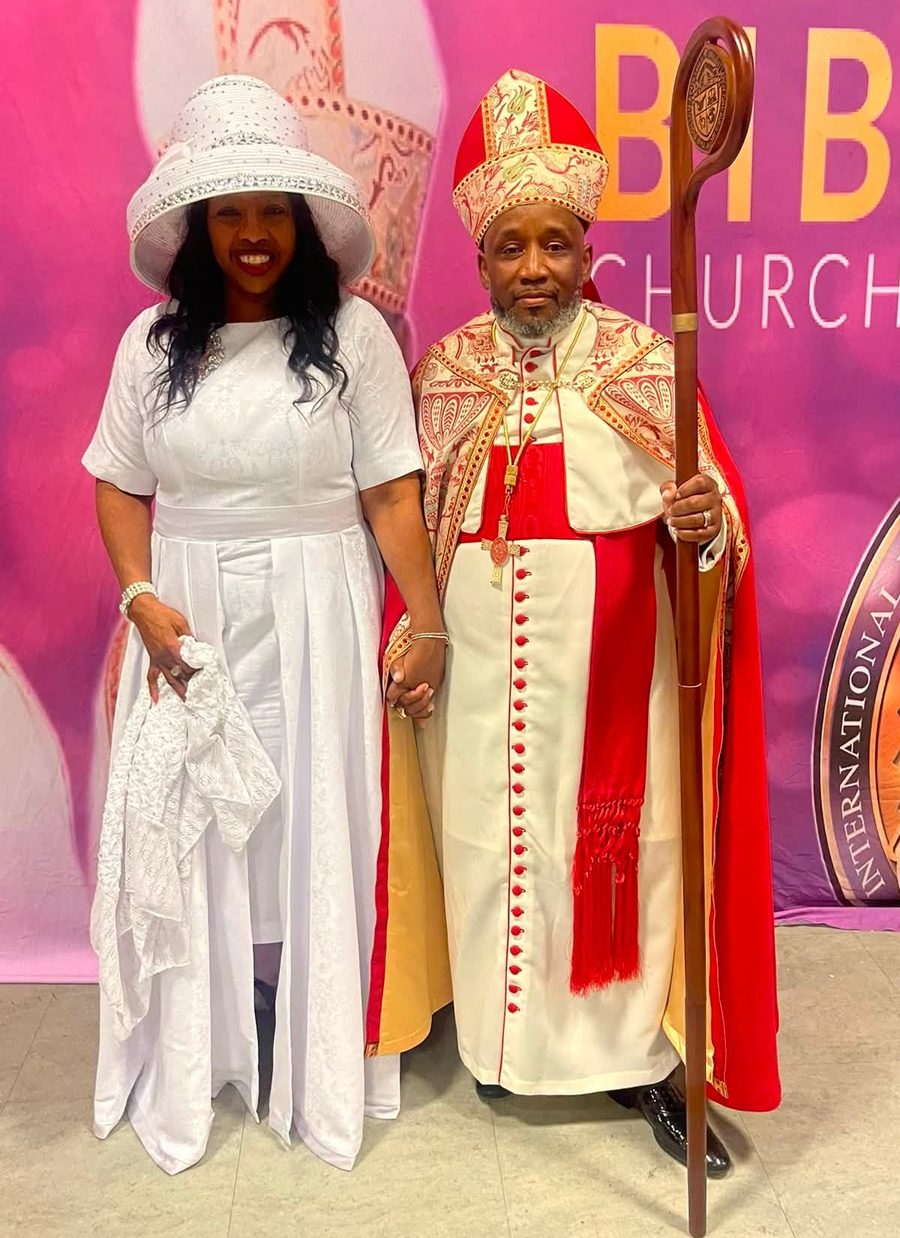 Chief Apostle Vincent L. Greaves Sr. in episcopal regalia, holding the crozier, with Pastor (Lady) Patricia H. Greaves.